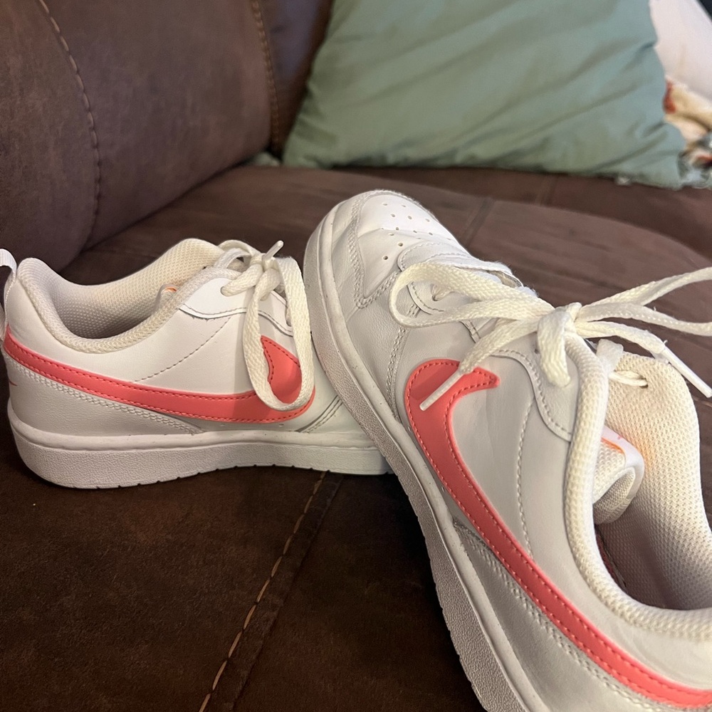 Nike Air Force 1 White Sneakers with Pink Accents